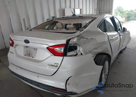 2013 Ford Fusion Hybrid Se z USA, uszkodzony, nr VIN 3FA6P0LU8DR357054